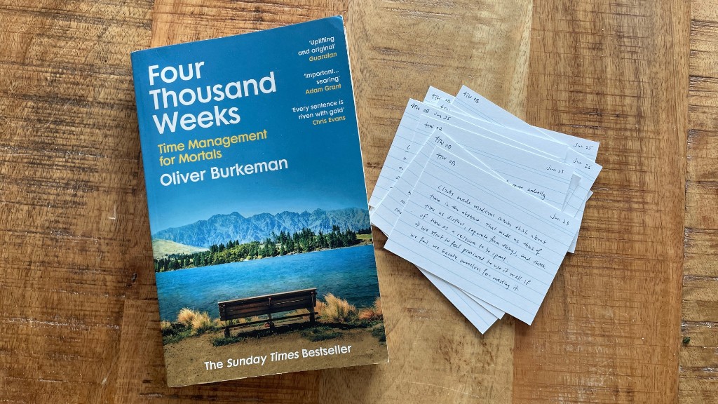 Four Thousand Weeks by Oliver Burkeman — landscape cover with a lakeside bench.